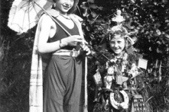 Lambourn Carnival - probably around 1937, Fancy Dress competition. Doris Taylor as Christmas Tree and possibly Fred, her brother, alongside.