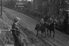 Pat and Pauline Bracey returning to Lambourn watched by a young Lester Piggott