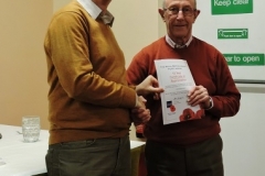 Mark presents Michael Oliver with his certificate - 10 year award