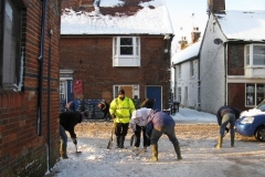 January 6th 2010   Voulnteers helping to clear the High Street