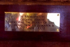 Brass plaque to honour George Baker