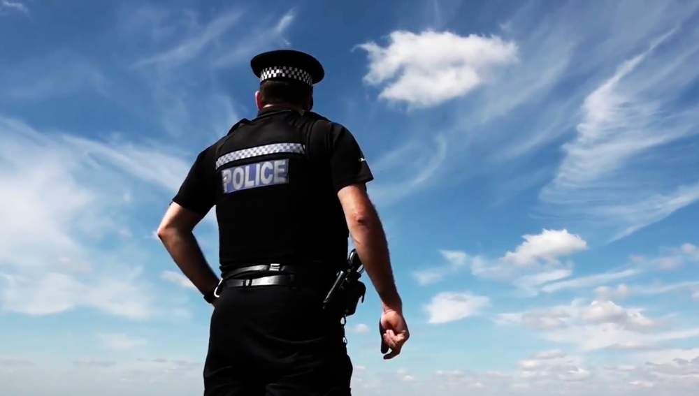 Policeman facing away