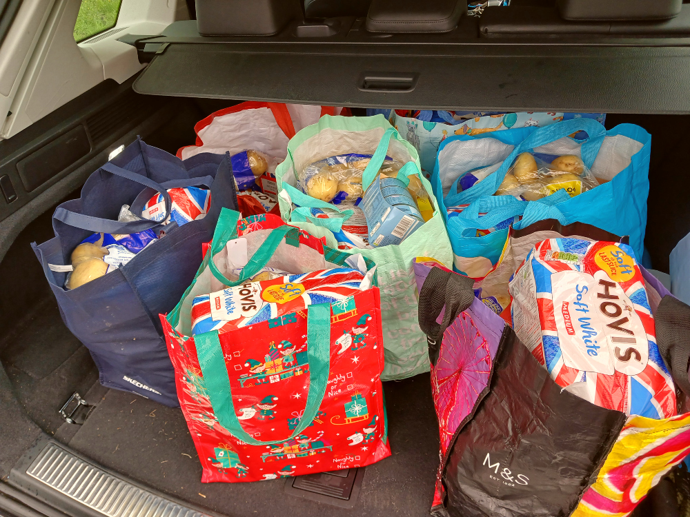 Bags of groceries in the boot of a car